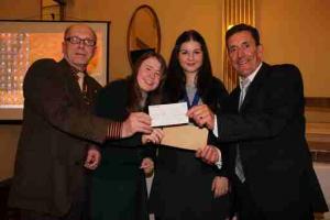 President of The Rotary Club of Southport links with Paul Howells and girls from KGV Interact Club